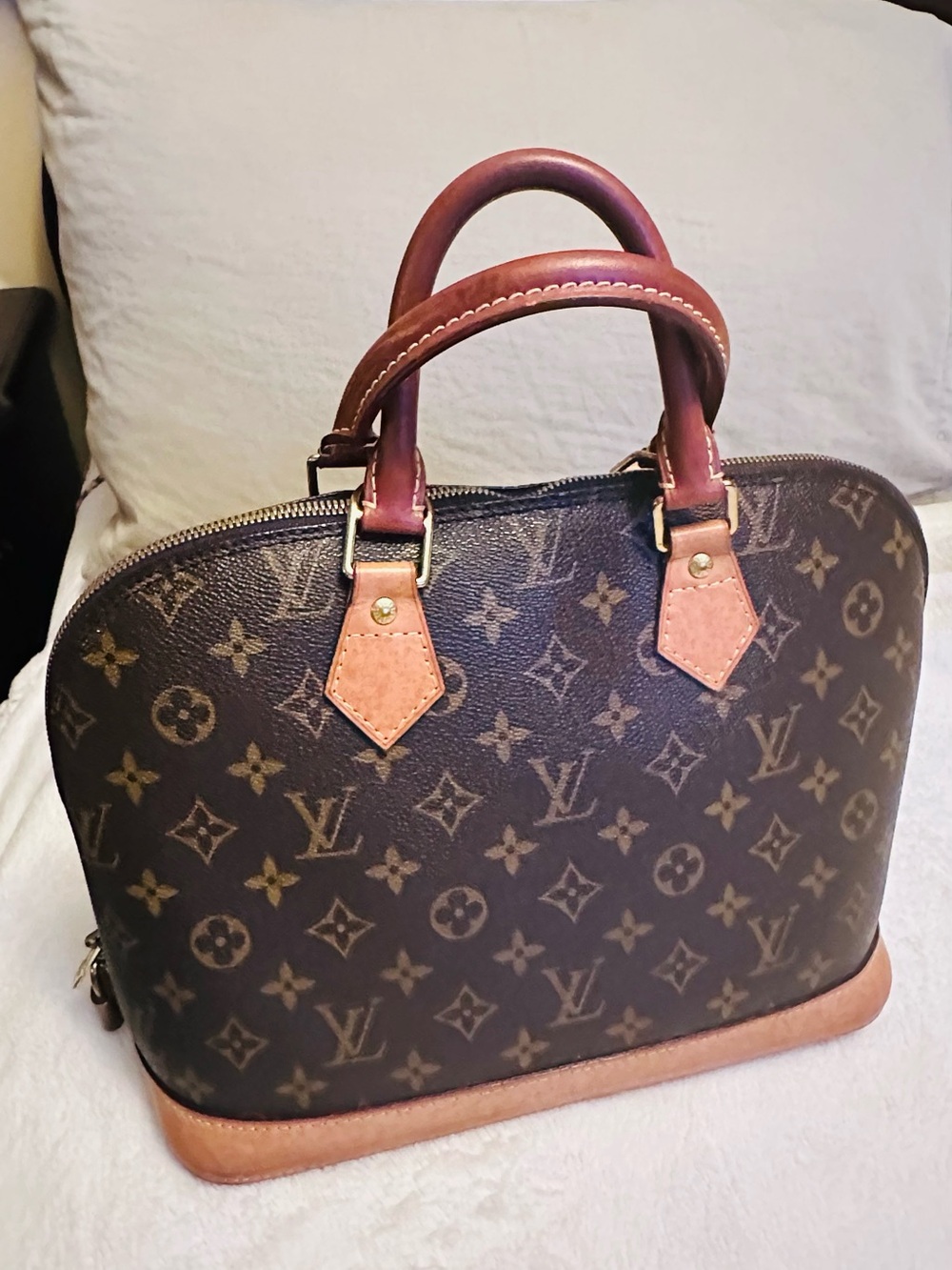 Louis Vuitton Monogram Alma Satchel in Brown and Tan Leather it’s a vintage ALMA